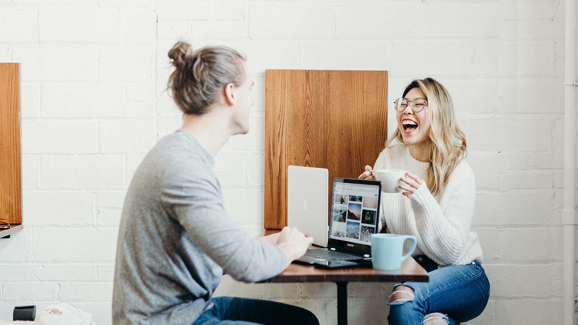 Creative professional writing and designing storytelling content at a bright studio desk